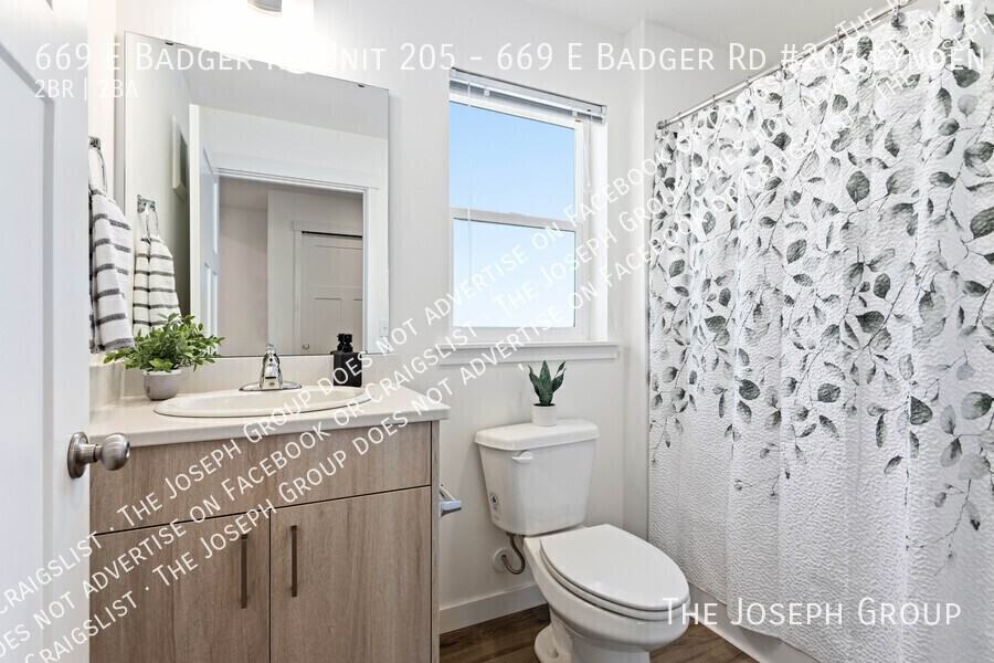 669 E Badger Rd Unit 205 - Photo 7 of 28