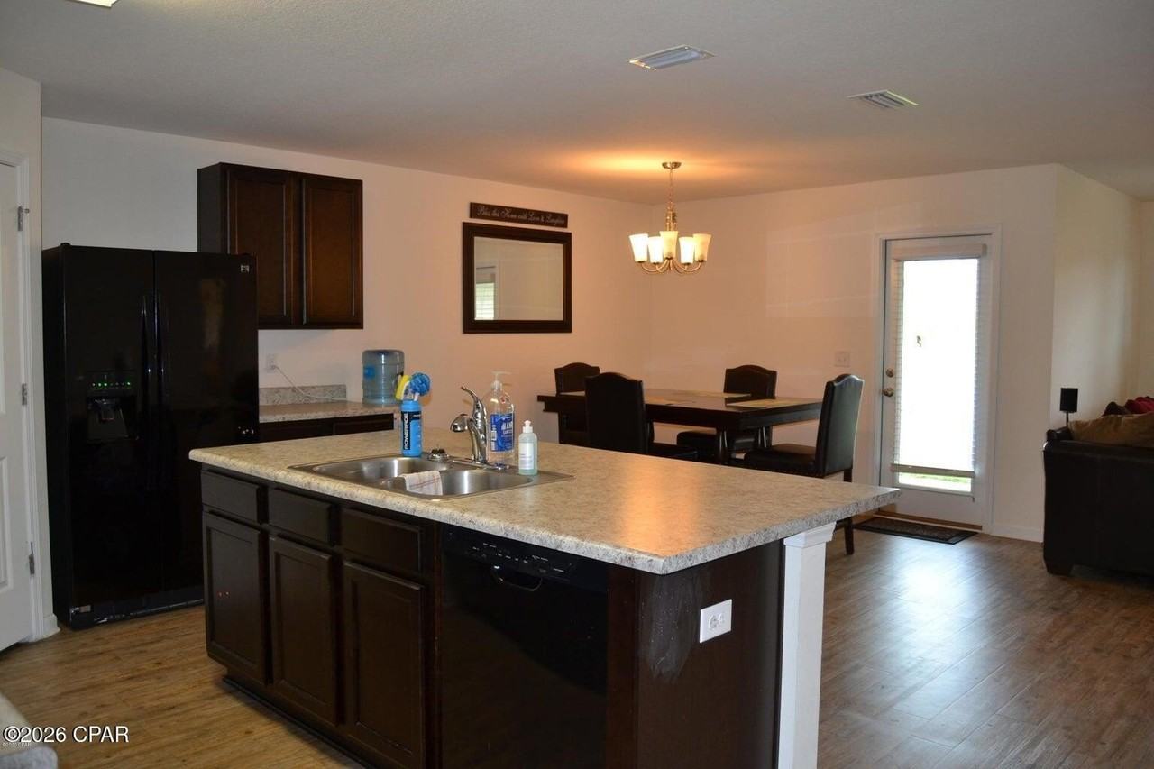 7106 Riverbrooke St - Photo 4 of 22