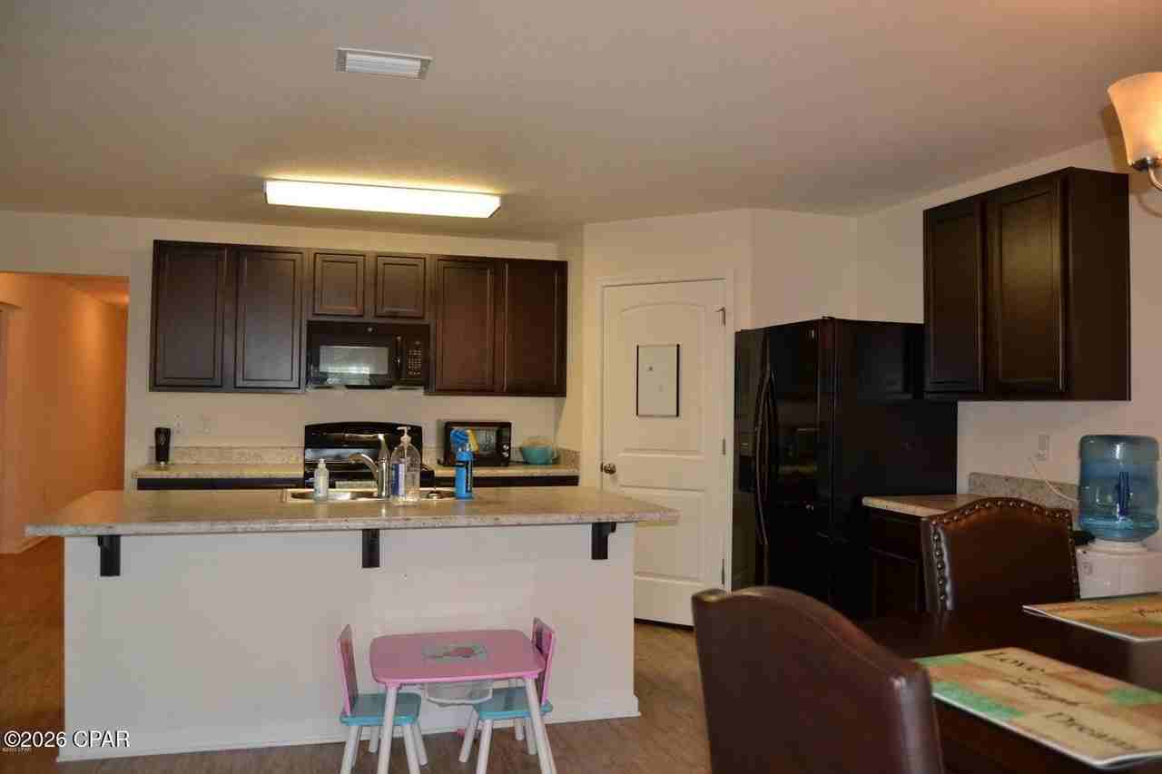 7106 Riverbrooke St - Photo 5 of 22