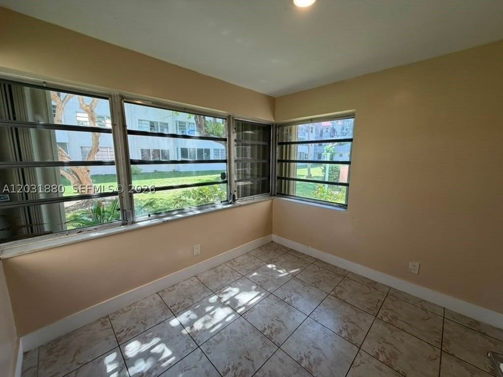 1450 Ne 191st St #106 - Photo 4 of 13