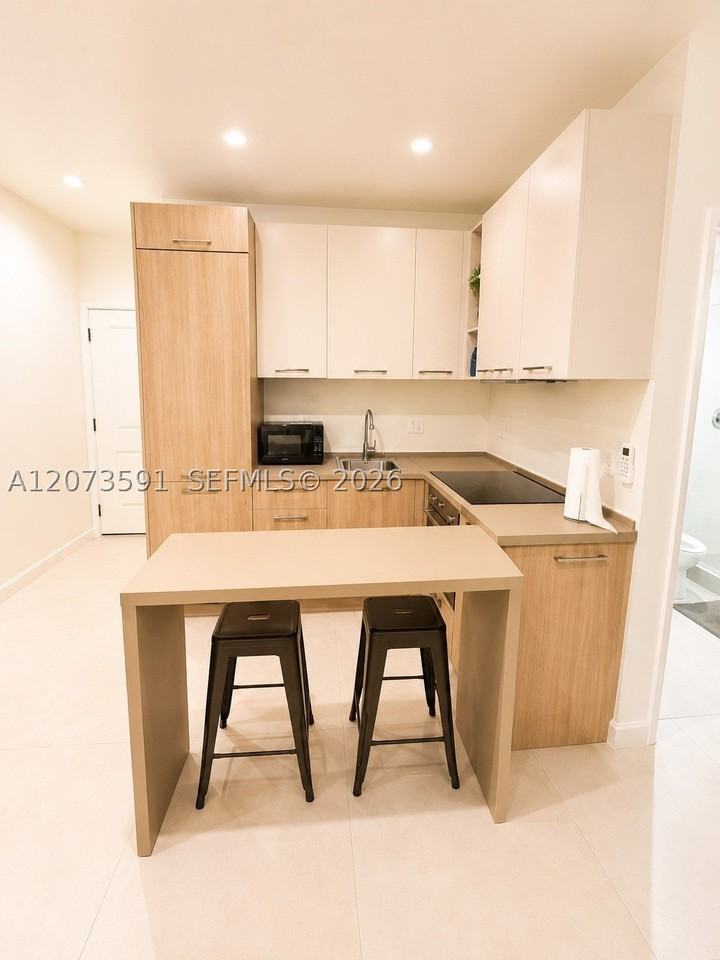 245 Ne 33rd St #107 - Photo 7 of 9