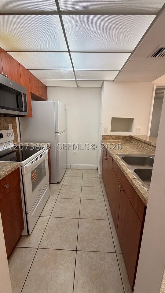 7075 Nw 186th St #C208 - Photo 3 of 28