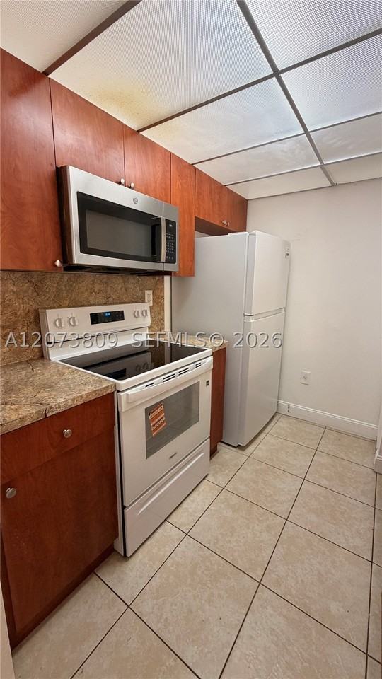 7075 Nw 186th St #C208 - Photo 4 of 28