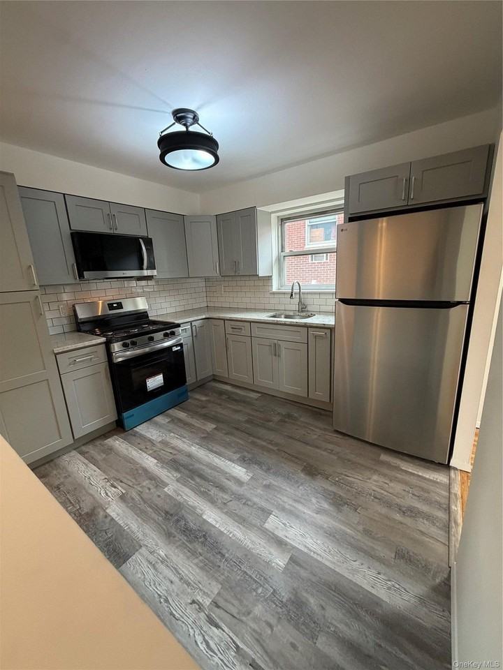 1927 84th St #3rdFL - Photo 6 of 24