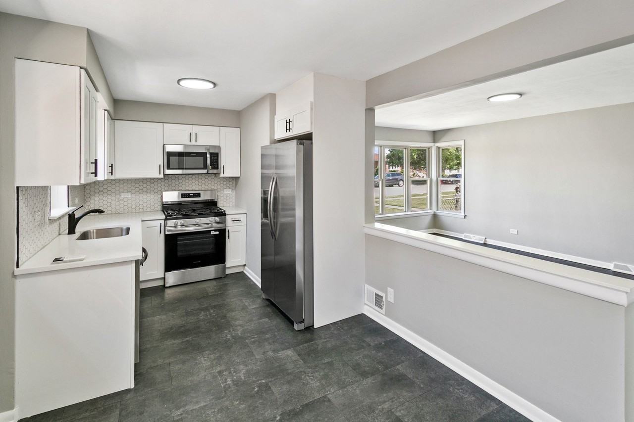 7704 Mcvicker Ave - Photo 5 of 22