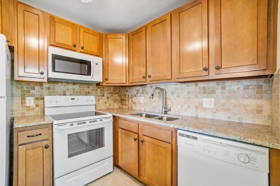 400 Village Green Cir W #102 - Photo 2 of 11