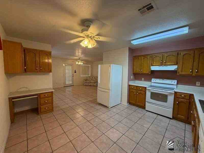 13613 E 52nd St - Photo 4 of 25