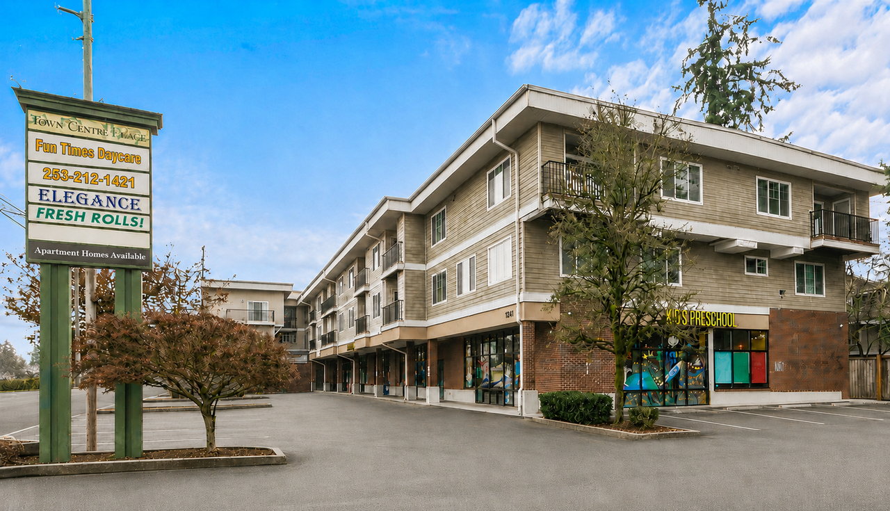 Town Centre Village Apartments - Photo 2 of 12