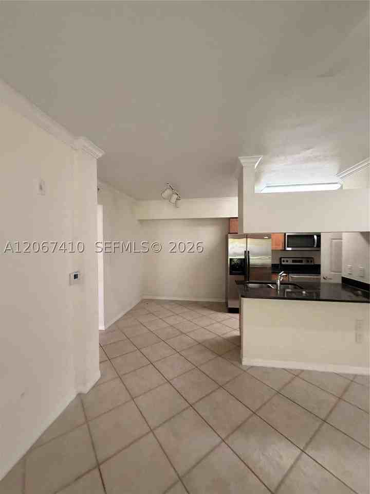6492 Emerald Dunes Dr #107 - Photo 3 of 11