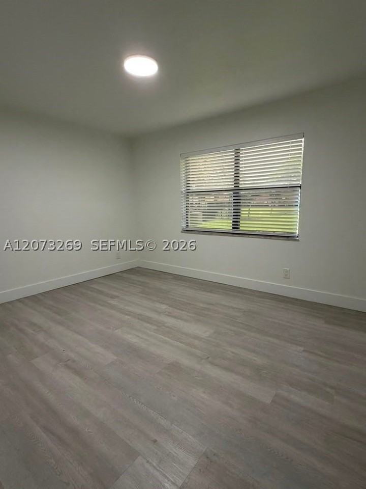 10020 Winding Lake Rd #104 - Photo 7 of 30