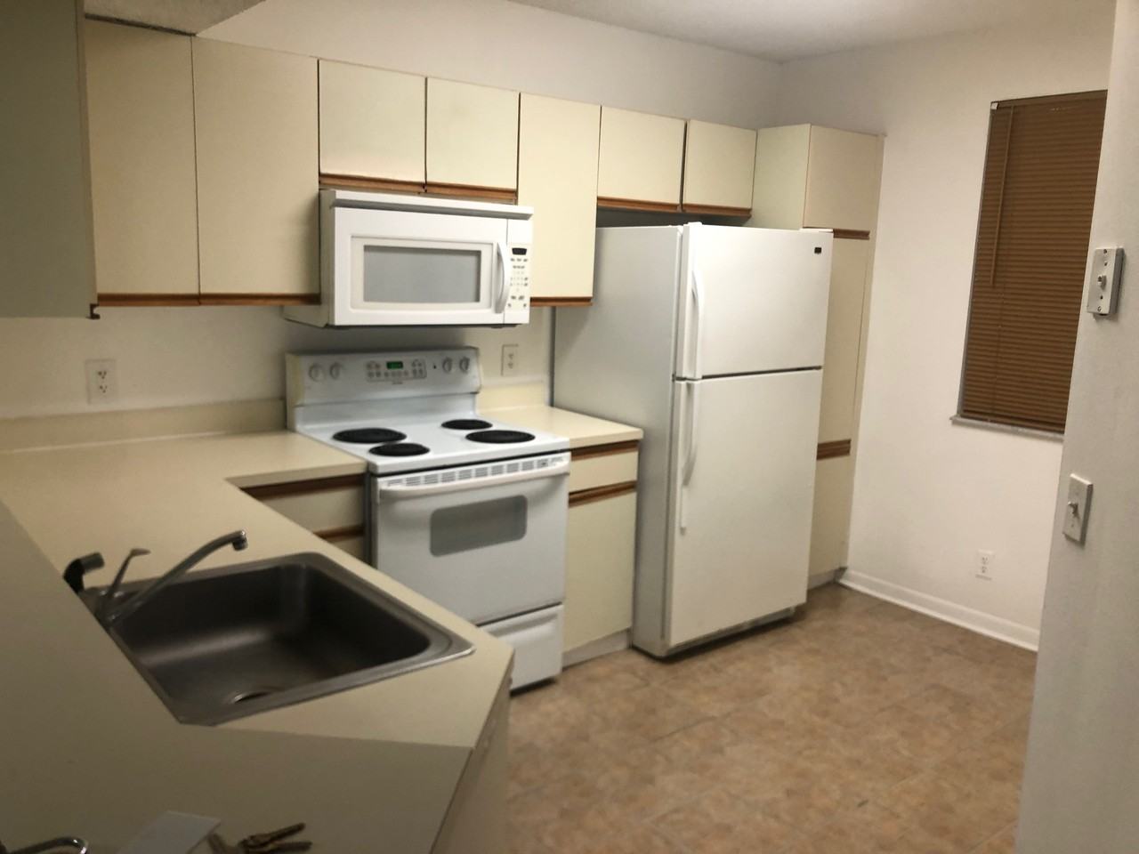8781 Wiles Road - Photo 2 of 5
