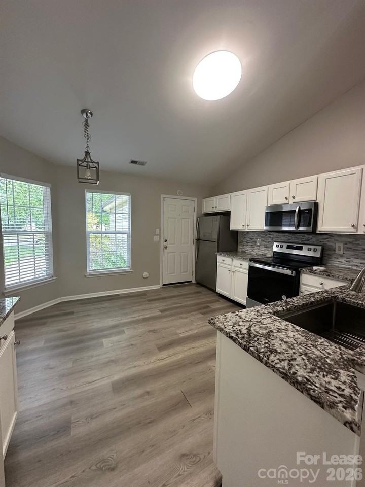 14108 Riding Hill Ave - Photo 4 of 12