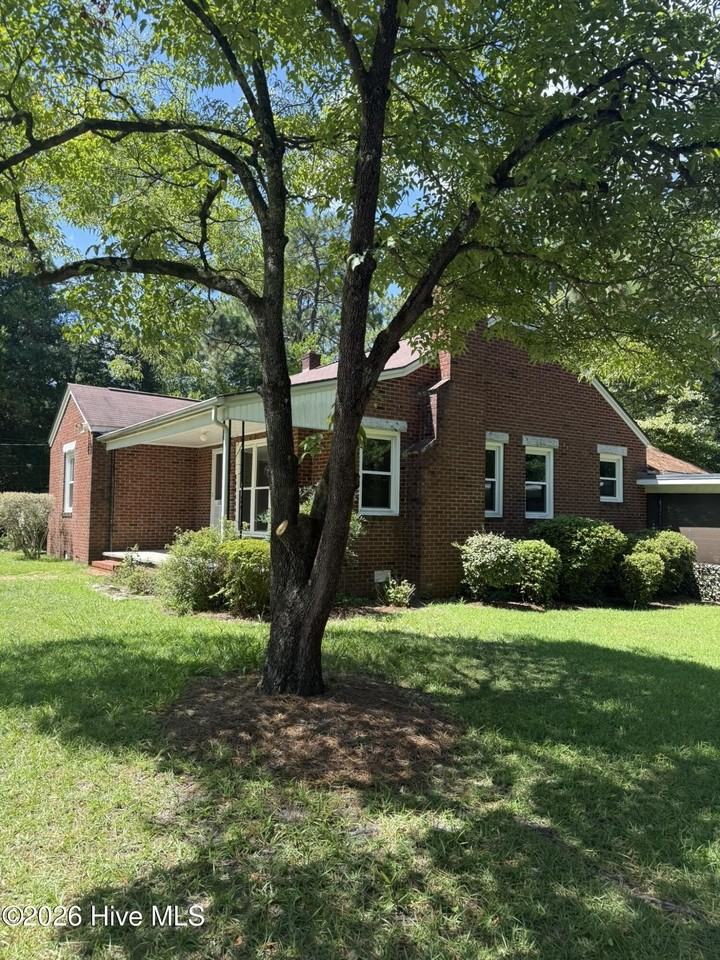 1203 N Poplar St - Photo 4 of 22
