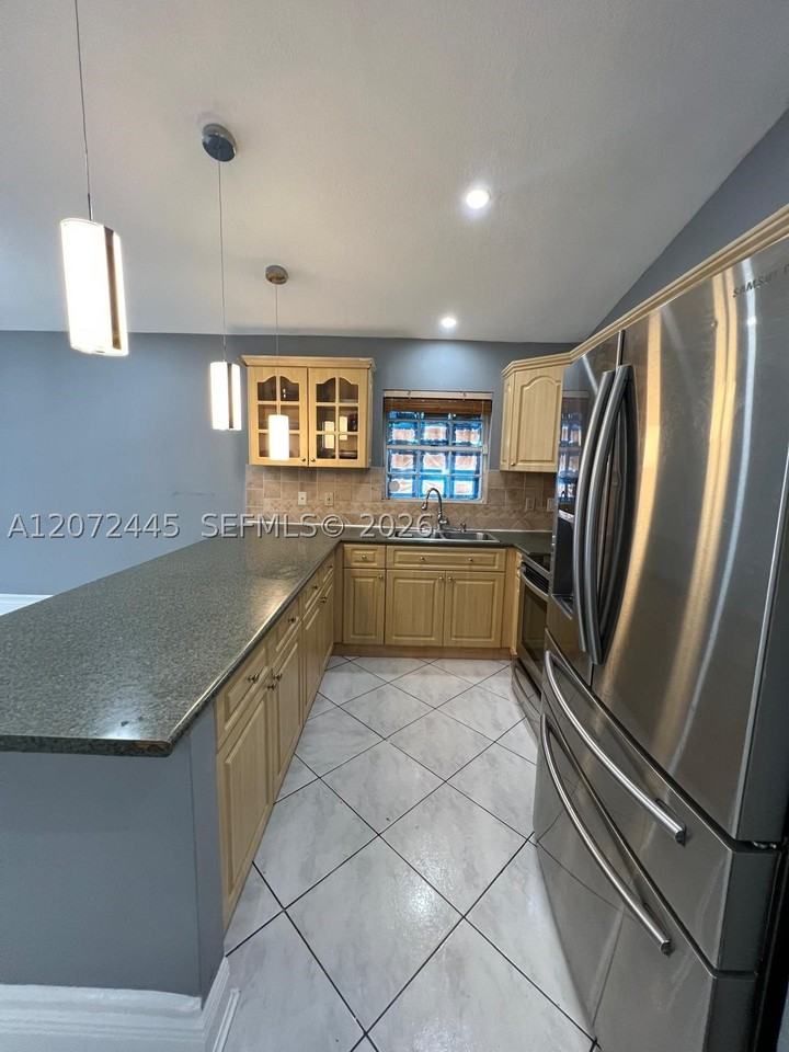 6978 W 25th Ave - Photo 3 of 17