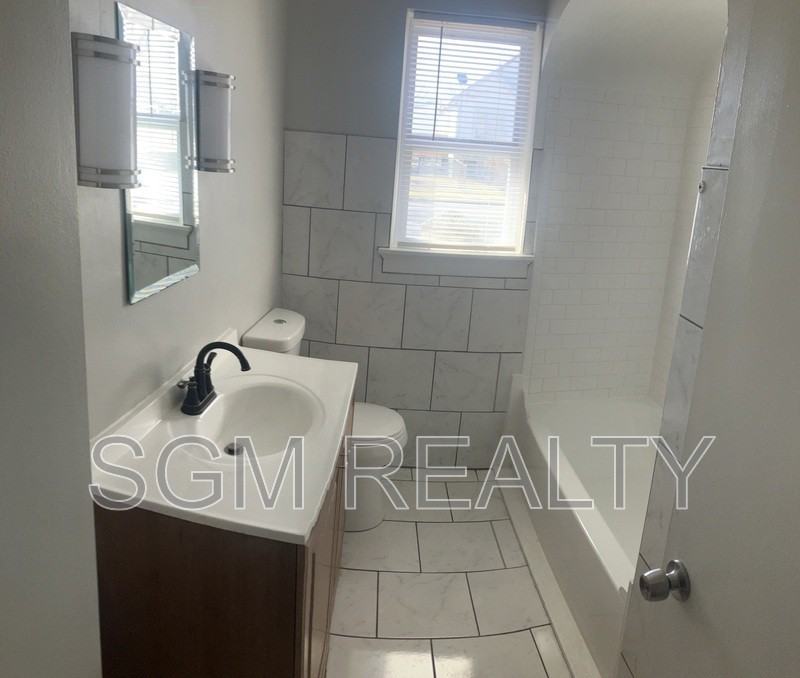 104 Williams St - Photo 6 of 8