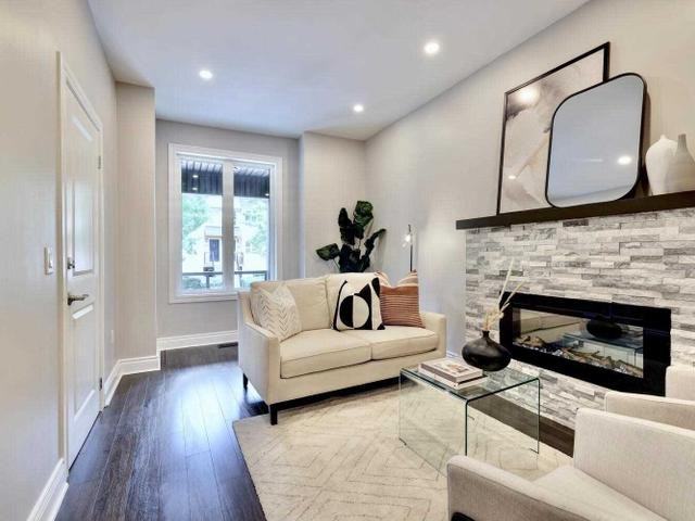 Renovated 2-Bed House-Style Rental with Private Garage & Patio | Utilities Included - Photo 4 of 19