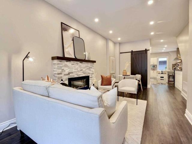 Renovated 2-Bed House-Style Rental with Private Garage & Patio | Utilities Included - Photo 3 of 19