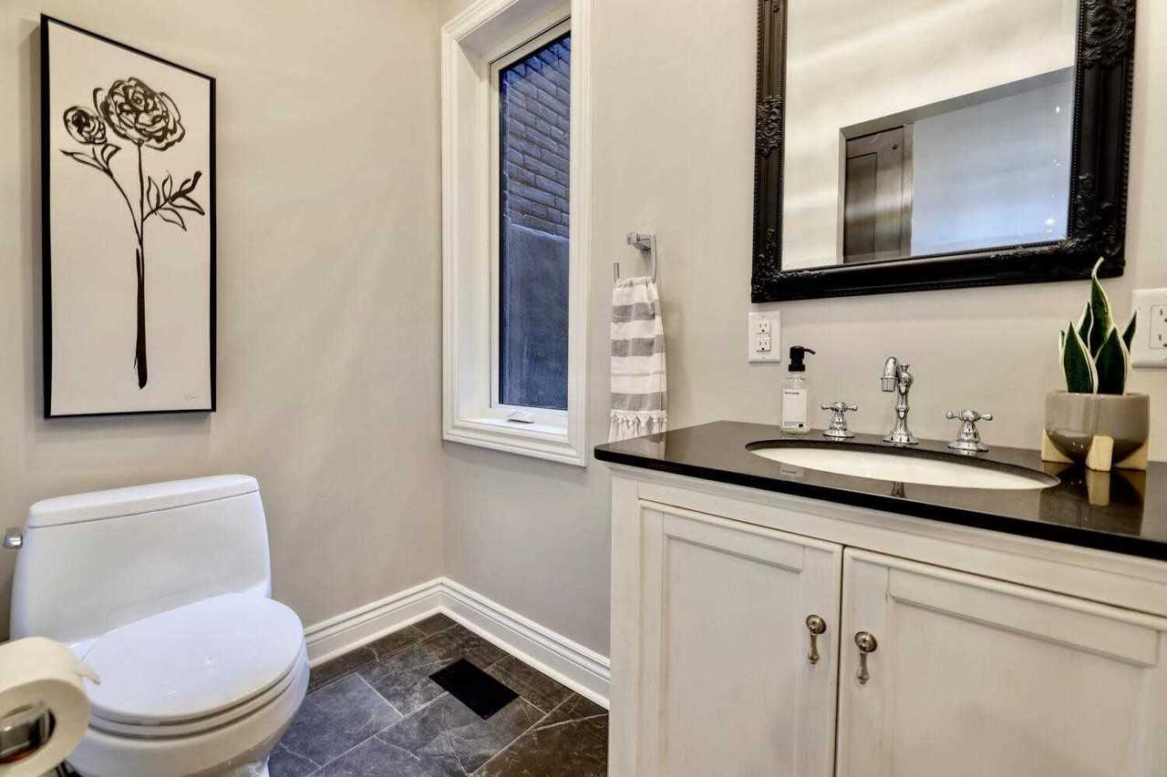 Renovated 2-Bed House-Style Rental with Private Garage & Patio | Utilities Included - Photo 6 of 19