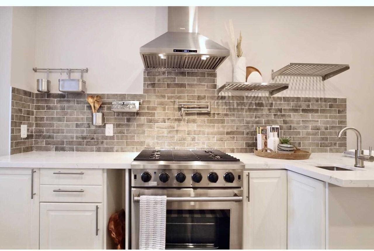Renovated 2-Bed House-Style Rental with Private Garage & Patio | Utilities Included - Photo 7 of 19