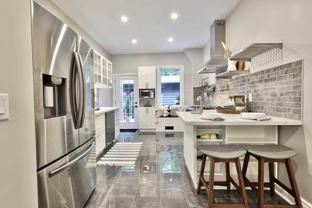 Renovated 2-Bed House-Style Rental with Private Garage & Patio | Utilities Included - Photo 1 of 1