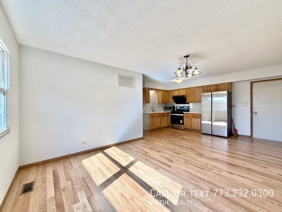 222 W 26th St #205 - Photo 2 of 18