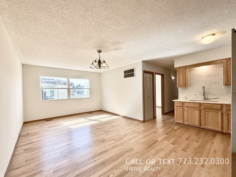 222 W 26th St #205 - Photo 3 of 18