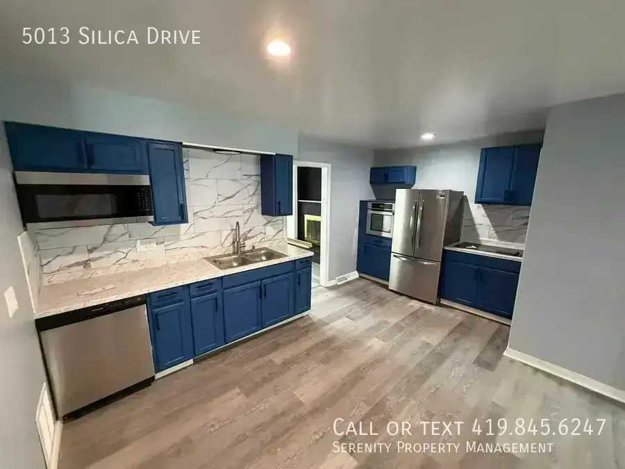 5013 Silica Dr - Photo 2 of 4