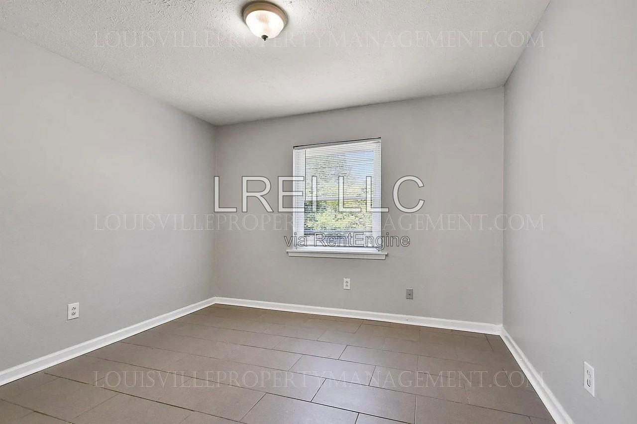 8300 Candleglow Ln - Photo 4 of 15