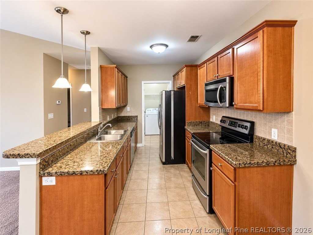 2645 Mcarthur Landing Cir #203 - Photo 4 of 21