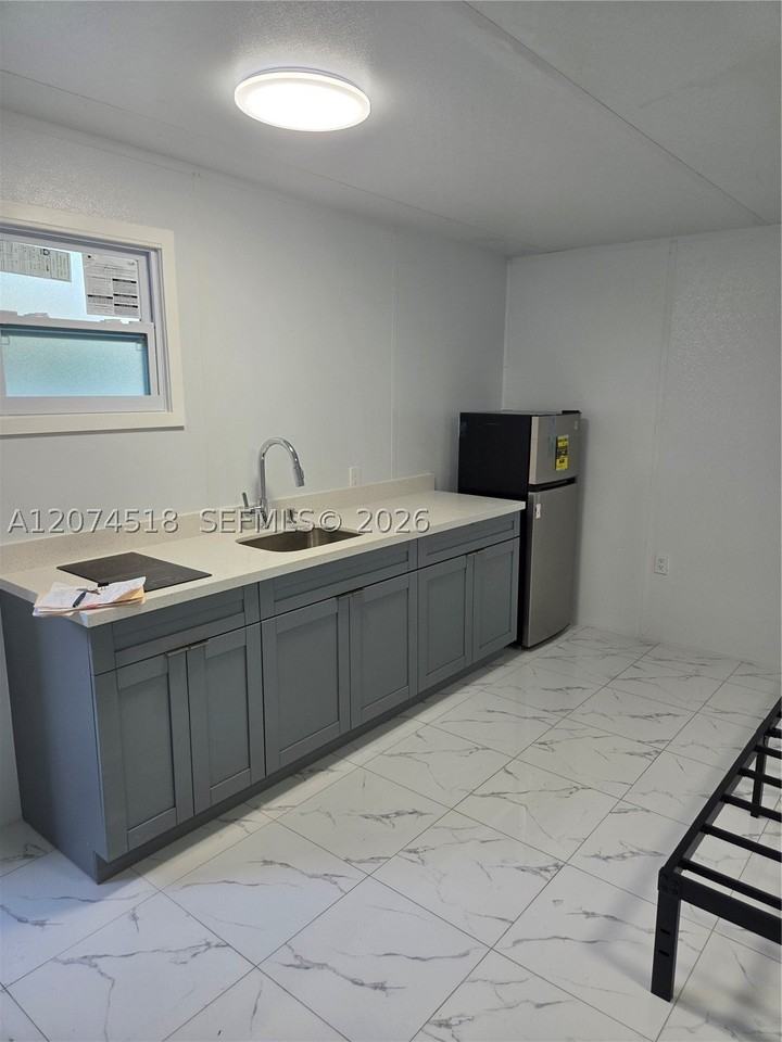 1760 Nw 56th St #REAR - Photo 4 of 14