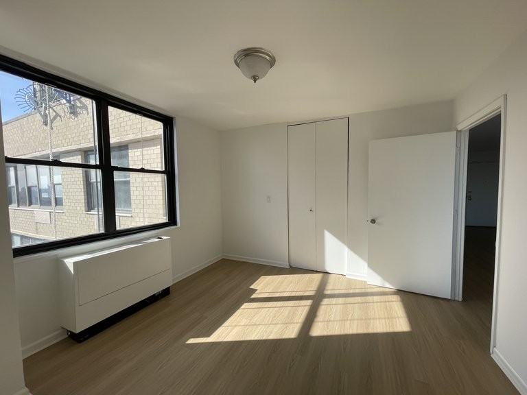 E 27th St #10 - Photo 2 of 7
