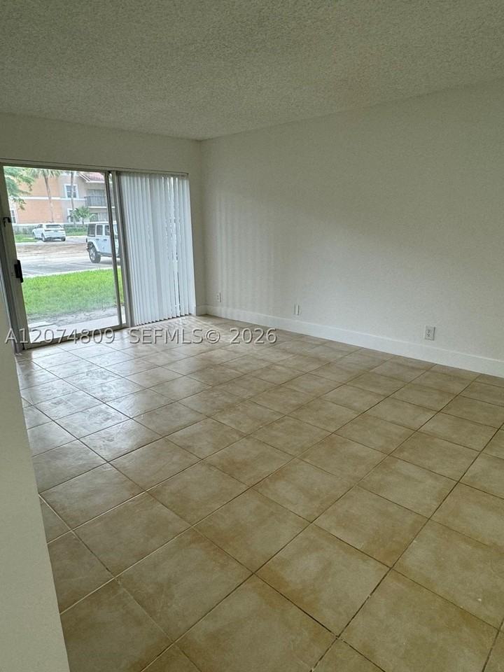 8801 Wiles Rd #103 - Photo 2 of 22
