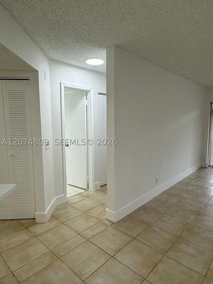 8801 Wiles Rd #103 - Photo 4 of 22