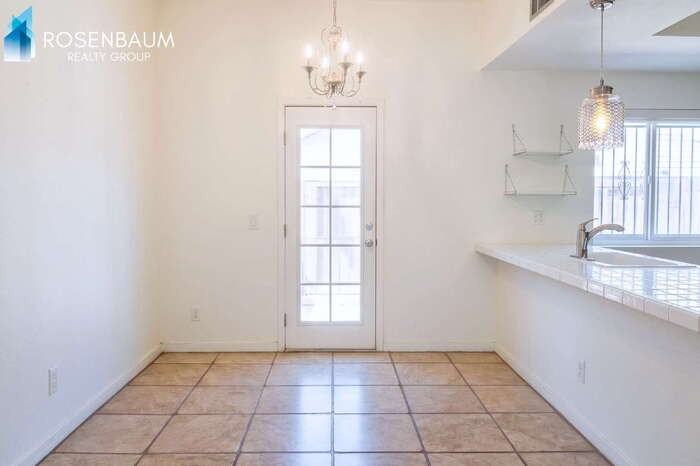 1143 E 12th St #1143 - Photo 3 of 8
