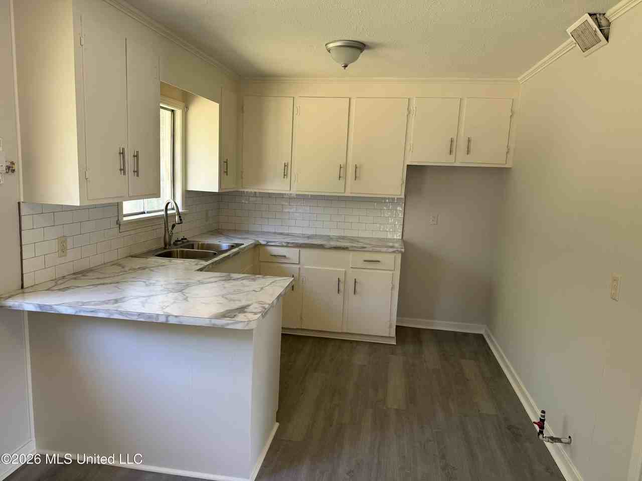 302 Saint Paul St - Photo 2 of 12