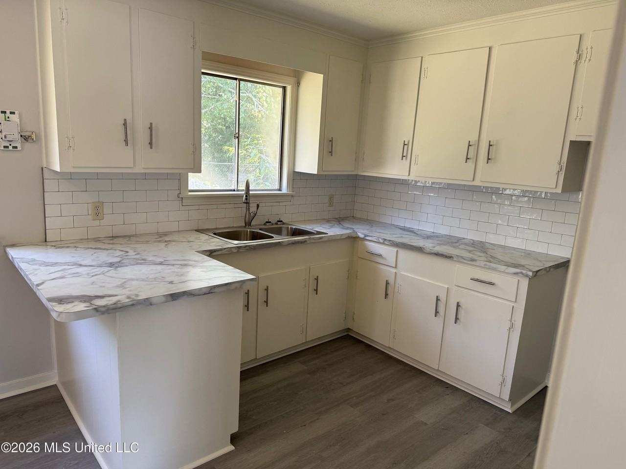 302 Saint Paul St - Photo 3 of 12