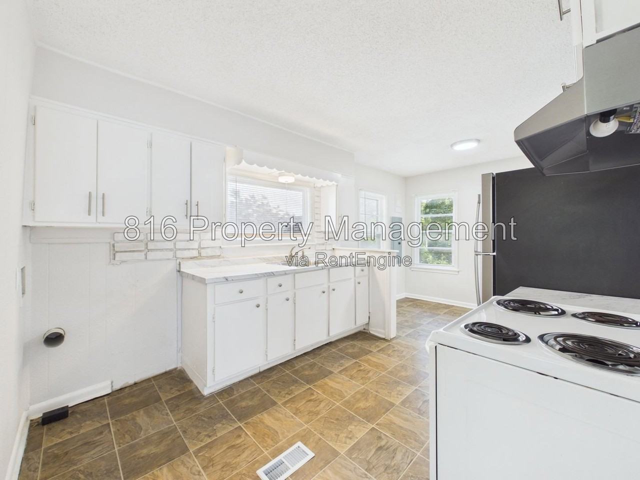 1309 E 84th Ter - Photo 4 of 15