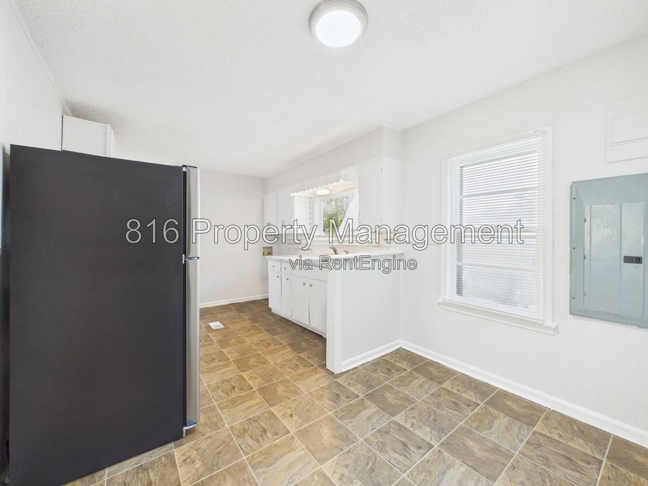 1309 E 84th Ter - Photo 5 of 15