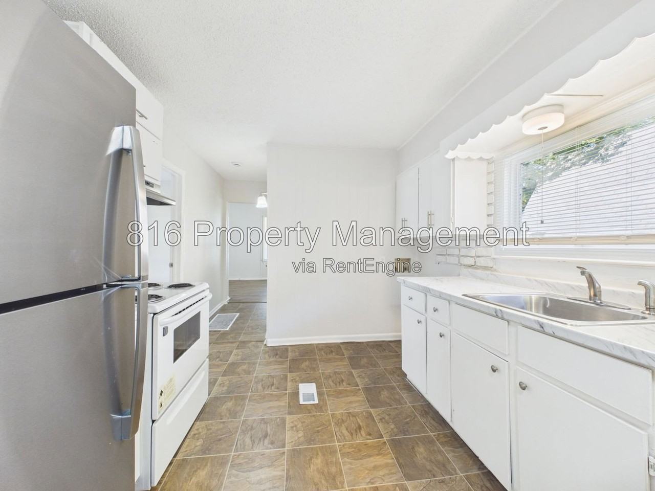 1309 E 84th Ter - Photo 6 of 15