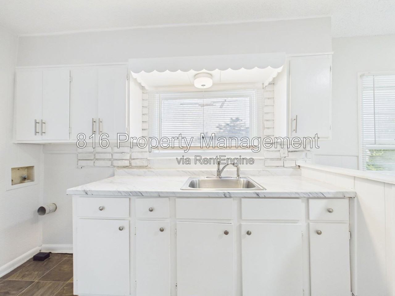 1309 E 84th Ter - Photo 7 of 15