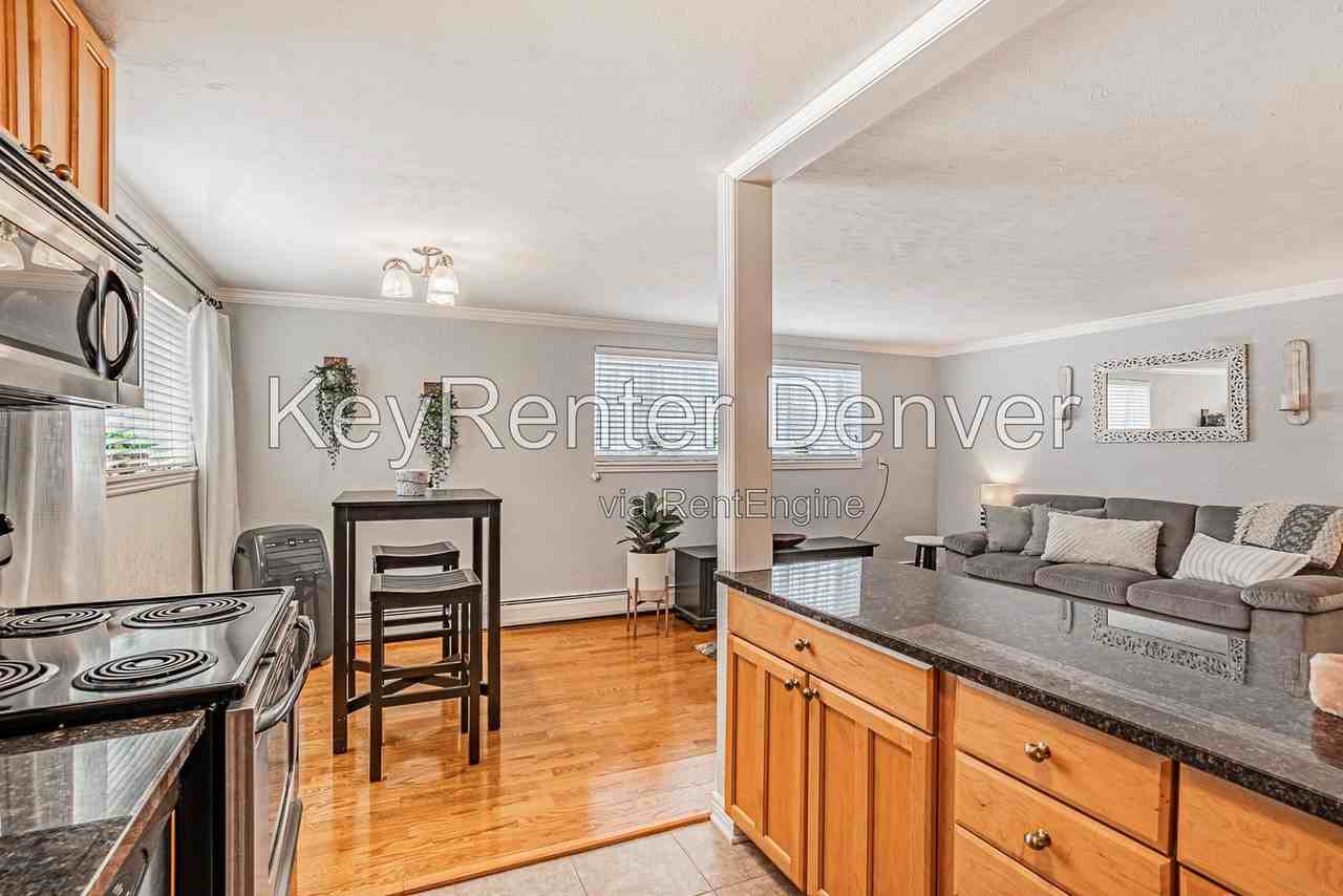 1151 N Marion St #104 - Photo 3 of 43