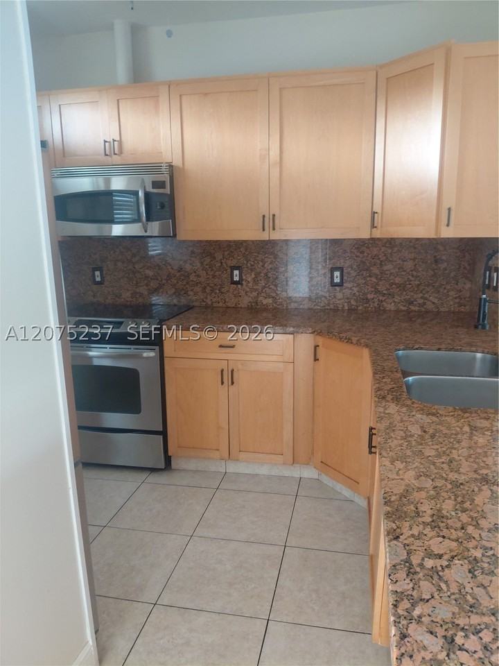 5495 Nw 10th Ct #304 - Photo 2 of 9
