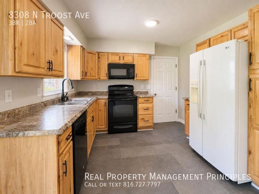 8308 N Troost Ave - Photo 4 of 26