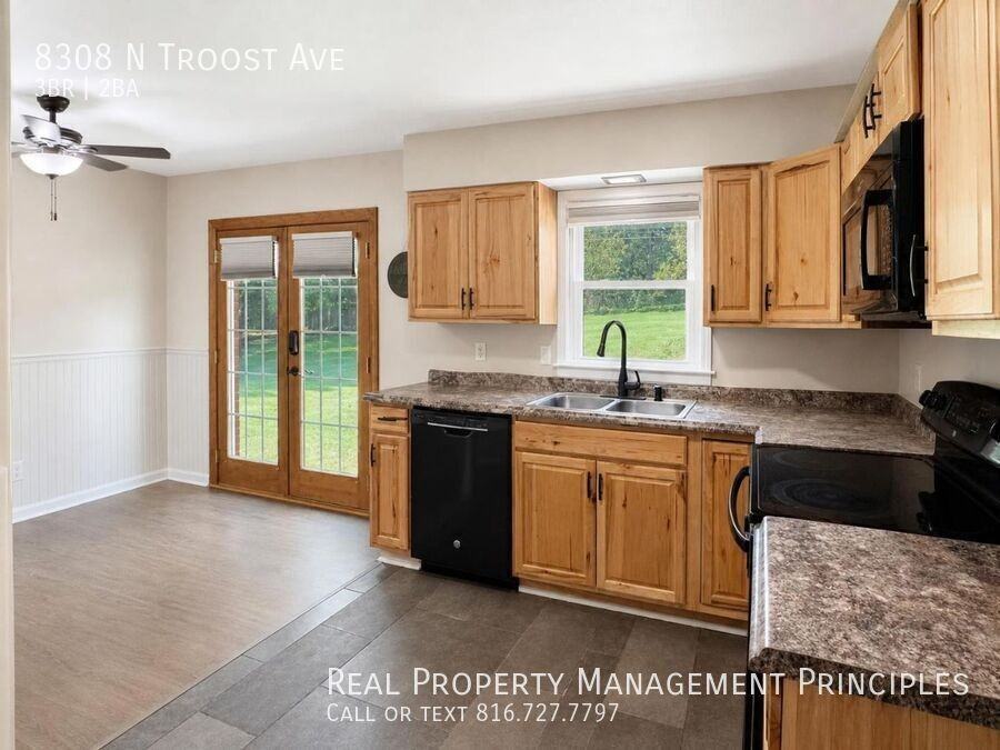 8308 N Troost Ave - Photo 5 of 26