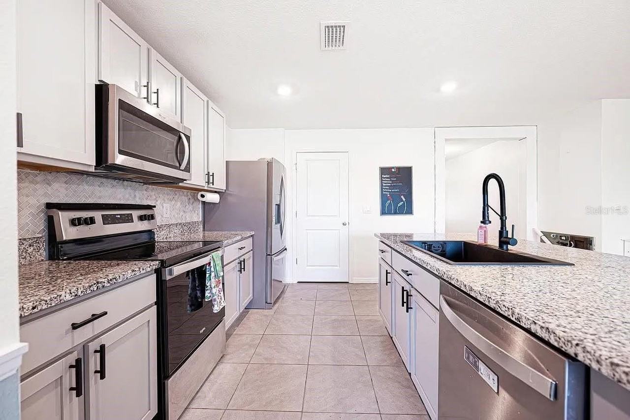 8574 Triumph Cir - Photo 4 of 16