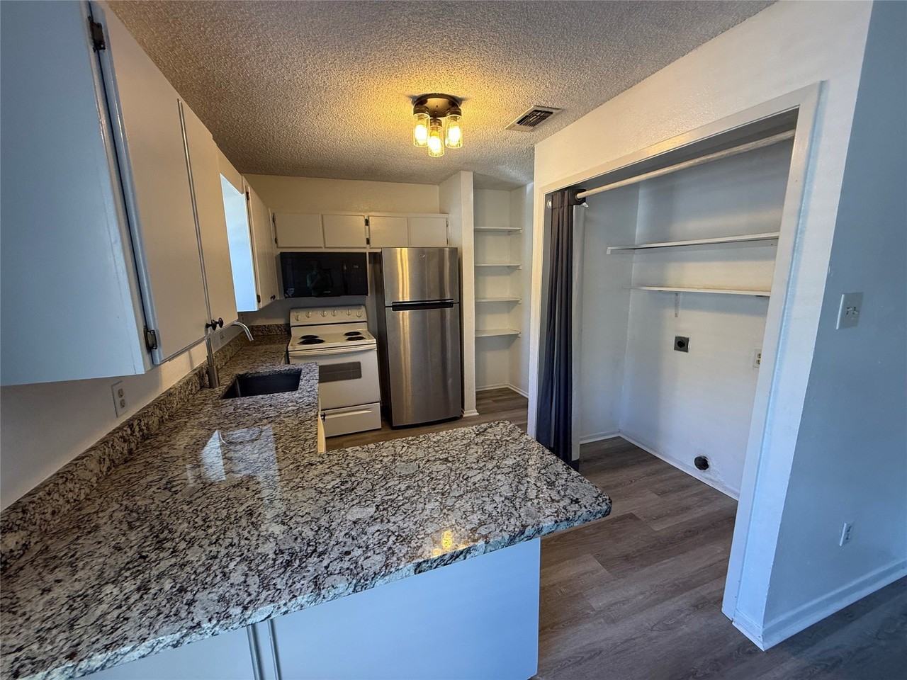 409 W 3rd St #411 - Photo 5 of 16