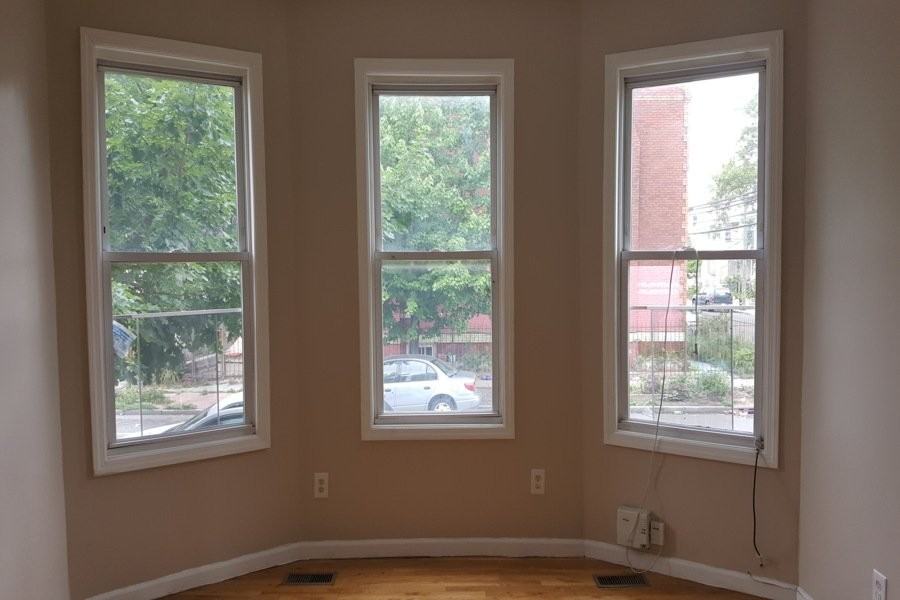 64 9th Ave W #1stFL - Photo 3 of 13