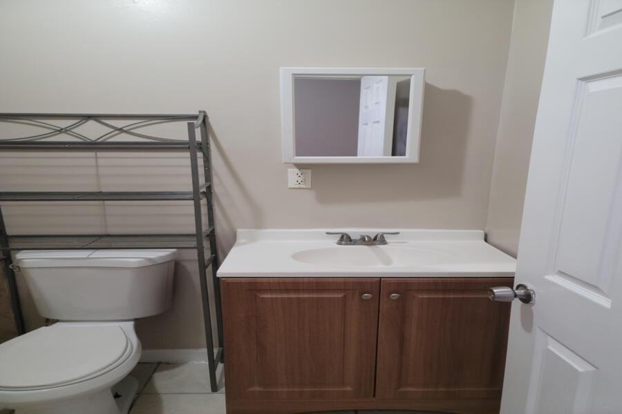 64 9th Ave W #1stFL - Photo 5 of 13