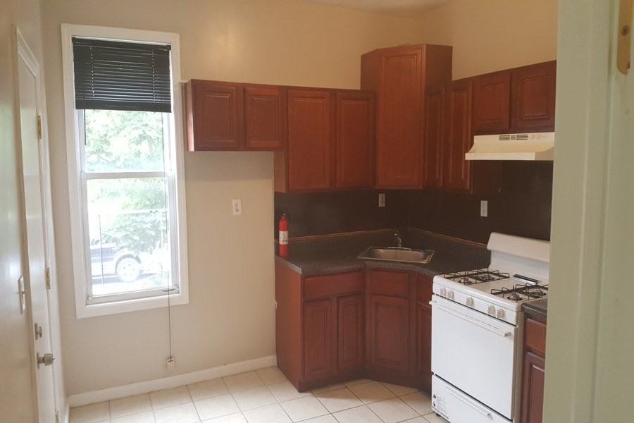 64 9th Ave W #1stFL - Photo 7 of 13