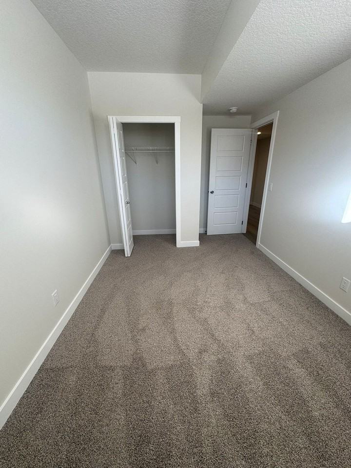 216 Drystone Walk Nw - Photo 4 of 9